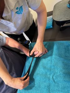close up of OT making a hand splint